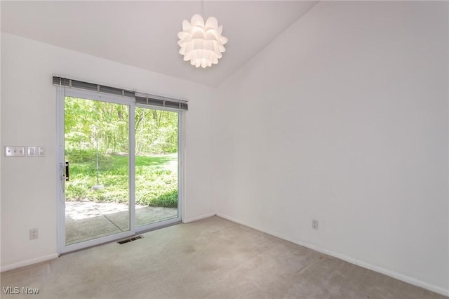 12562 Harold Dr, Chesterland, OH 44026 - carpeted spare room with vaulted ceiling, baseboards, and a chandelier