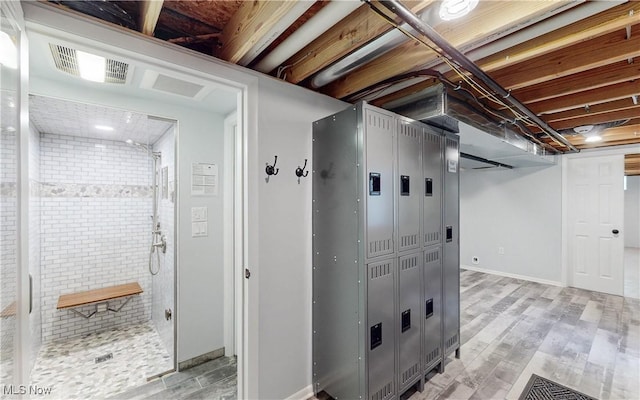 below grade area featuring light wood-type flooring