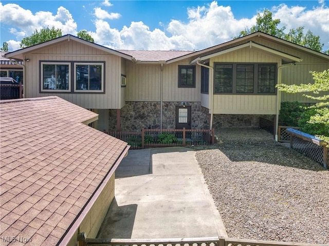 view of front of home with fence
