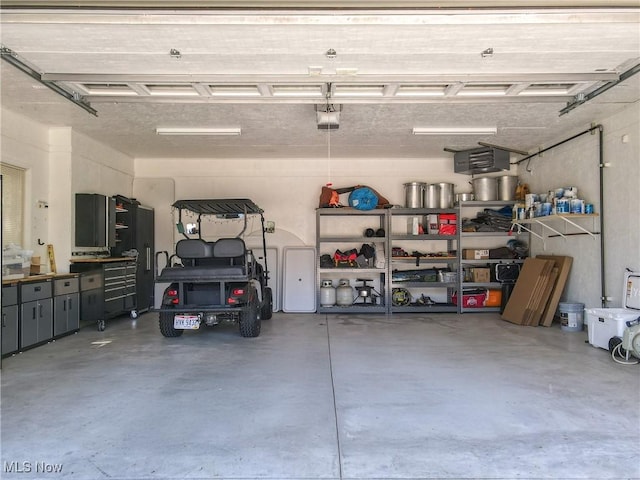 garage featuring a garage door opener