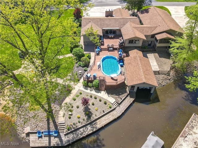 view from above of property with a pool area