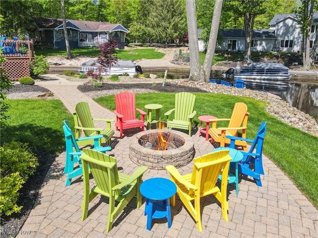 view of patio / terrace with a fire pit
