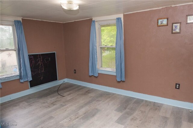 804 Hollywood Ave, East Liverpool, OH 43920 - empty room with wood finished floors and baseboards