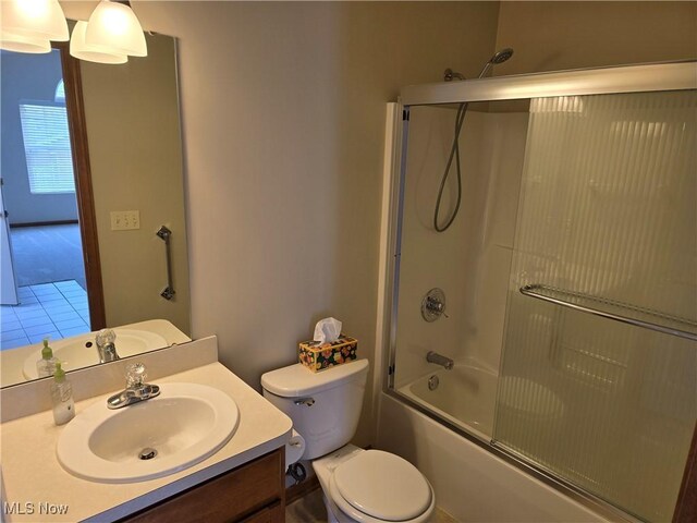 2457 Barrington Way, Wooster, OH 44691 - bathroom featuring vanity, bath / shower combo with glass door, toilet, and tile patterned flooring