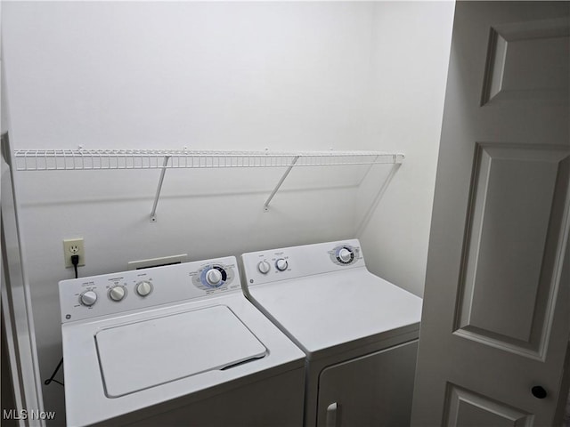 2457 Barrington Way, Wooster, OH 44691 - clothes washing area featuring washing machine and dryer
