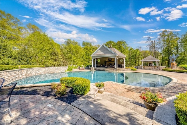 915 Creek View Dr, Aurora, OH 44202 - outdoor pool with a gazebo, a patio, an exterior structure, and an outdoor structure
