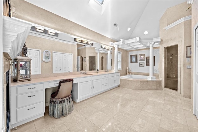915 Creek View Dr, Aurora, OH 44202 - full bath featuring ornate columns, a stall shower, a garden tub, vanity, and tile patterned flooring