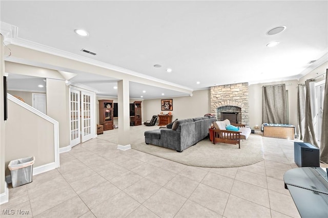 915 Creek View Dr, Aurora, OH 44202 - living area with light tile patterned floors, recessed lighting, crown molding, baseboards, and a fireplace