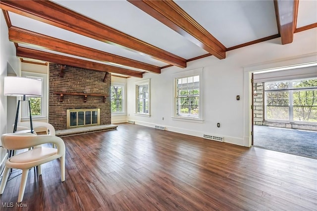 899 Park Blvd W, East Liverpool, OH 43920 - living room with beamed ceiling, baseboards, a fireplace, and wood finished floors