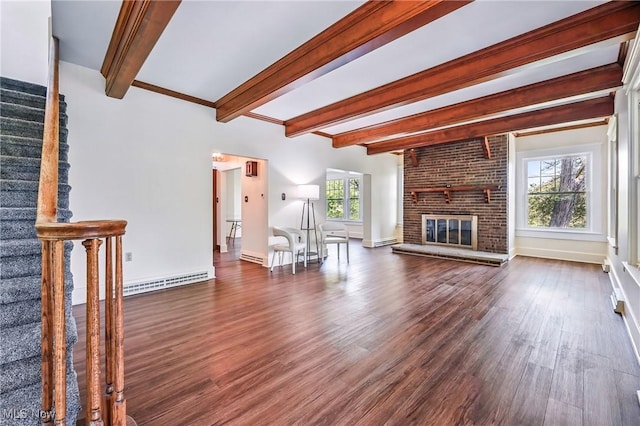 899 Park Blvd W, East Liverpool, OH 43920 - living area featuring beam ceiling, stairs, dark wood-type flooring, baseboards, and a brick fireplace