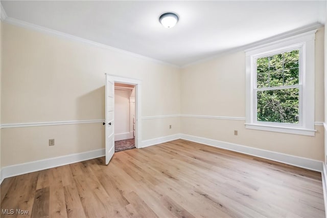 899 Park Blvd W, East Liverpool, OH 43920 - empty room featuring light wood-style floors, ornamental molding, and baseboards