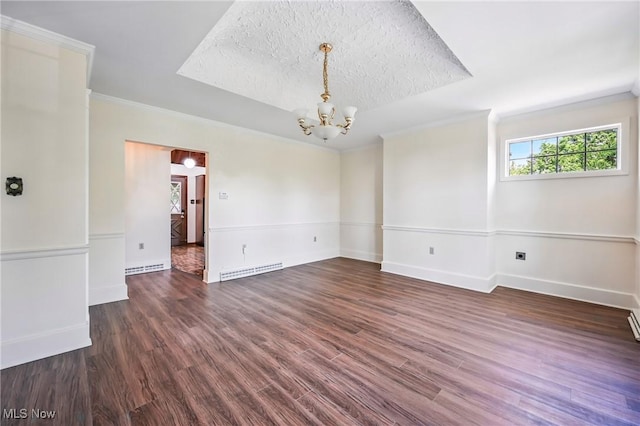 899 Park Blvd W, East Liverpool, OH 43920 - unfurnished room with a chandelier, wood finished floors, baseboards, ornamental molding, and a textured ceiling