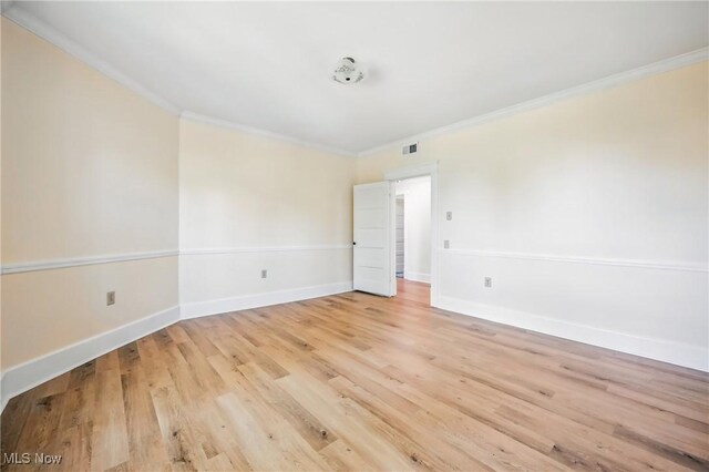 899 Park Blvd W, East Liverpool, OH 43920 - empty room with ornamental molding, light wood-style flooring, and baseboards