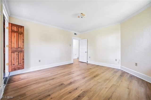 899 Park Blvd W, East Liverpool, OH 43920 - spare room with light wood-style flooring, crown molding, and baseboards