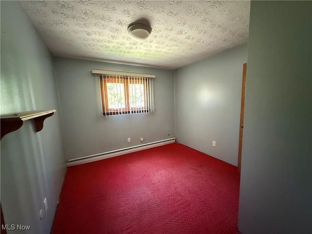6855 Painesville Ravenna Rd, Concord, OH 44077 - carpeted spare room with a baseboard radiator and a textured ceiling