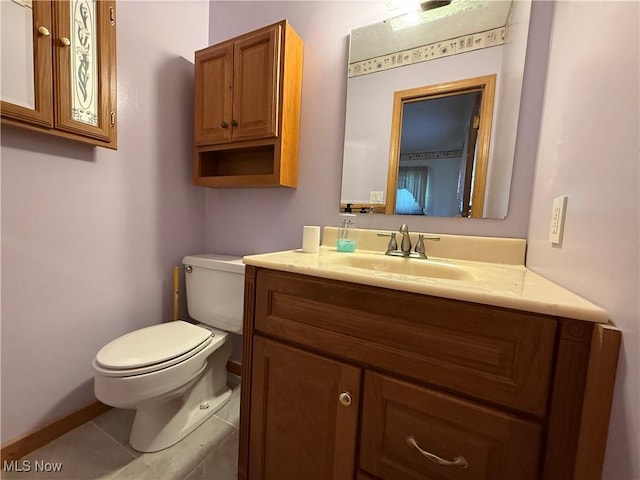 6855 Painesville Ravenna Rd, Concord, OH 44077 - half bath with toilet, vanity, and tile patterned floors