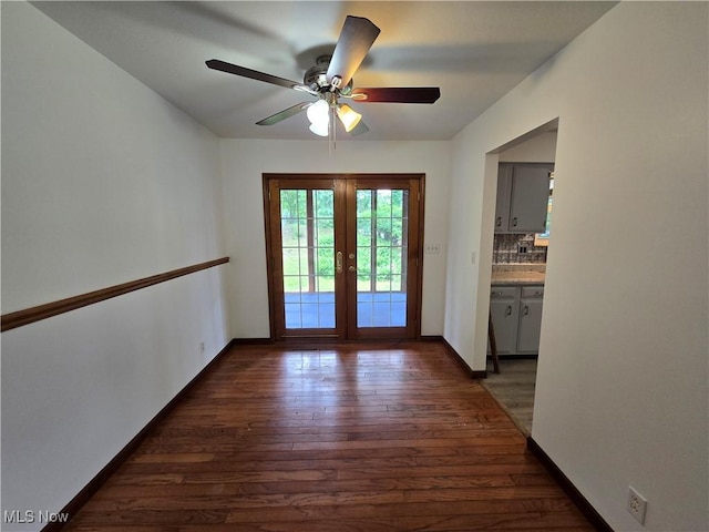 1308 17th St, Vienna, WV 26105 - doorway featuring dark wood-style flooring, french doors, ceiling fan, and baseboards