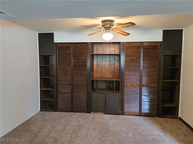 1308 17th St, Vienna, WV 26105 - unfurnished bedroom with carpet flooring, a closet, and ceiling fan