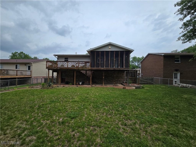 1308 17th St, Vienna, WV 26105 - back of property featuring stairway, a sunroom, and a wooden deck