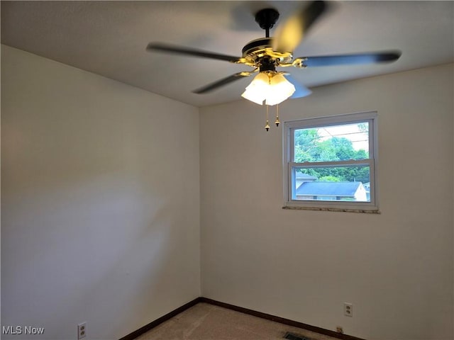 1308 17th St, Vienna, WV 26105 - spare room with baseboards, ceiling fan, and carpet flooring