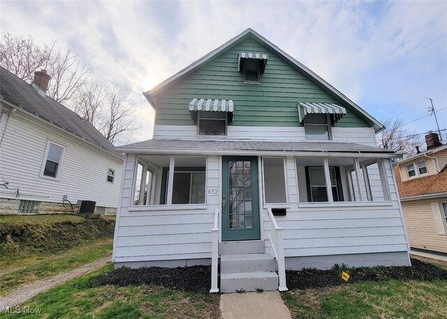 432 Fuller St, Akron, OH 44306 - view of front facade with cooling unit and entry steps