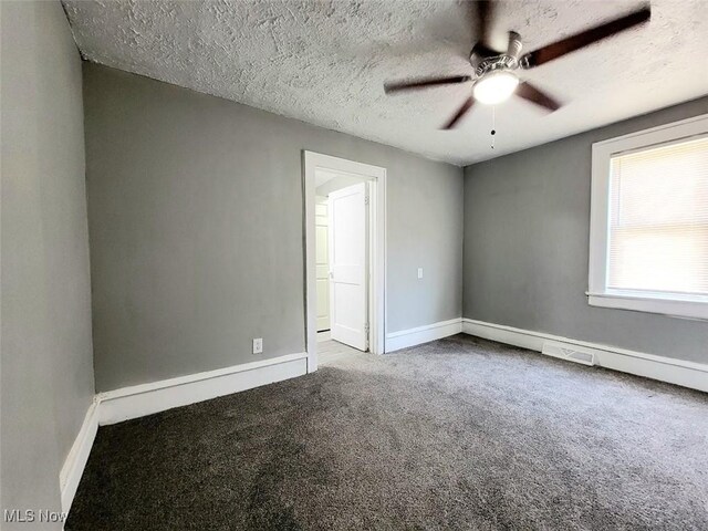 432 Fuller St, Akron, OH 44306 - unfurnished room with carpet floors, ceiling fan, a textured ceiling, and baseboards