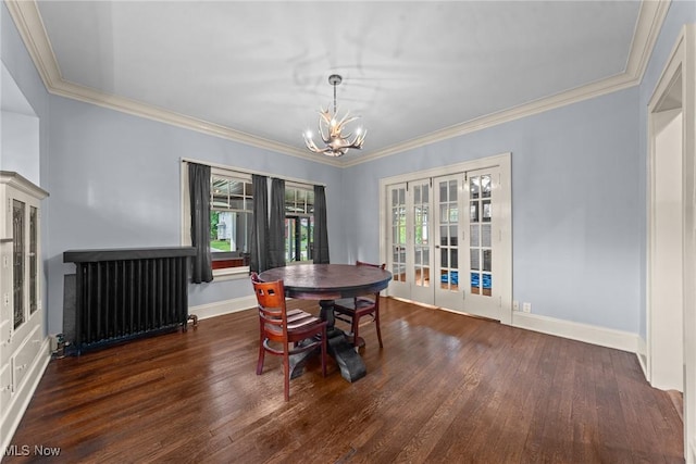 3004 Essex Rd, Cleveland Heights, OH 44118 - dining space featuring french doors, a chandelier, radiator heating unit, ornamental molding, and wood finished floors