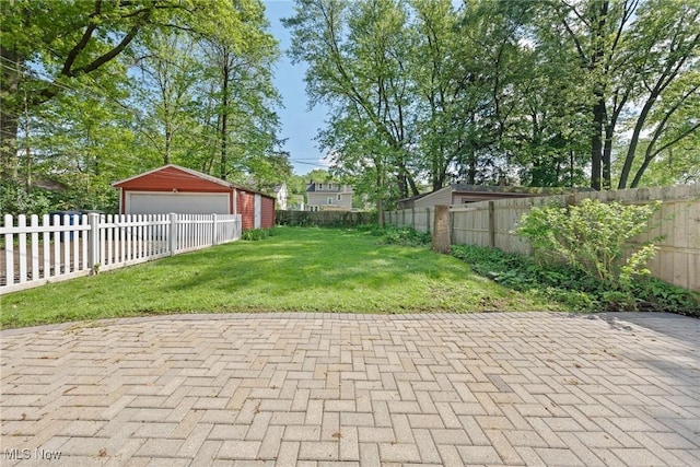 3004 Essex Rd, Cleveland Heights, OH 44118 - view of patio / terrace with a garage and an outbuilding