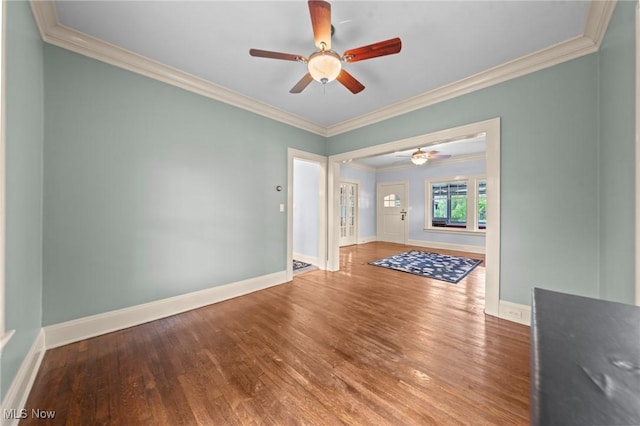 3004 Essex Rd, Cleveland Heights, OH 44118 - unfurnished room with wood finished floors, crown molding, a ceiling fan, and baseboards