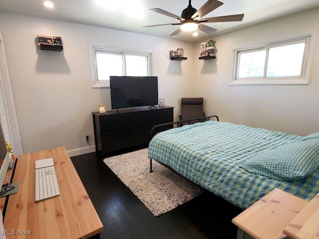 bedroom with multiple windows, dark wood-style flooring, baseboards, recessed lighting, and a ceiling fan