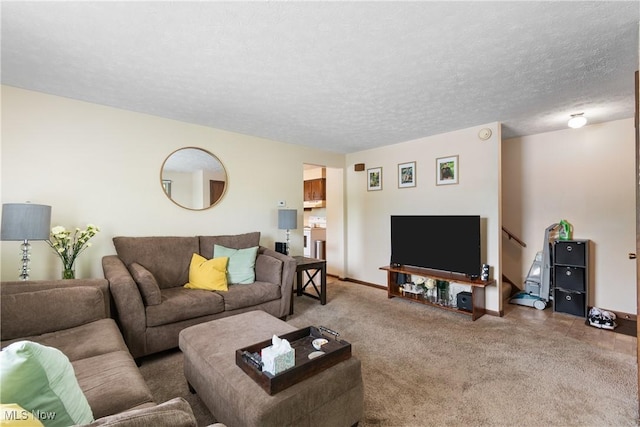 living room featuring carpet flooring, baseboards, and a textured ceiling