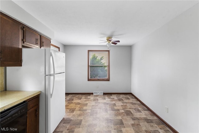 kitchen featuring dishwasher, ceiling fan, freestanding refrigerator, dark brown cabinets, and light countertops