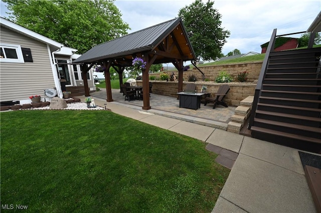 50277 Carroll Rd, East Liverpool, OH 43920 - view of grassy yard with a gazebo, a fire pit, a patio area, and stairs