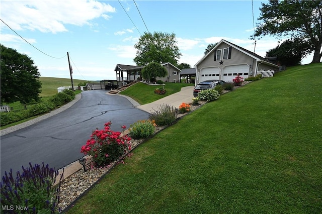 50277 Carroll Rd, East Liverpool, OH 43920 - view of front facade with a front lawn and asphalt driveway