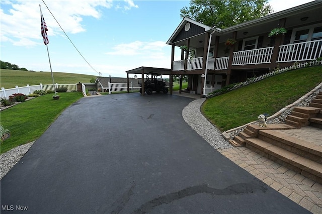 50277 Carroll Rd, East Liverpool, OH 43920 - view of property exterior with asphalt driveway and a carport