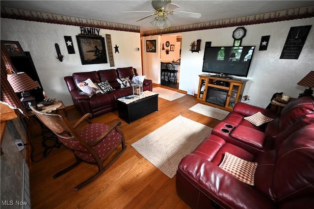 50277 Carroll Rd, East Liverpool, OH 43920 - living room featuring a ceiling fan and wood finished floors