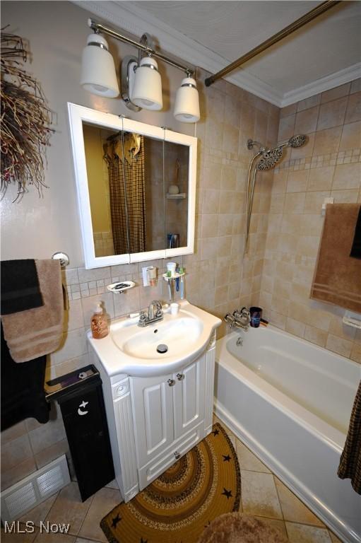 50277 Carroll Rd, East Liverpool, OH 43920 - bathroom featuring crown molding, tile patterned floors, shower / bathtub combination with curtain, tile walls, and vanity