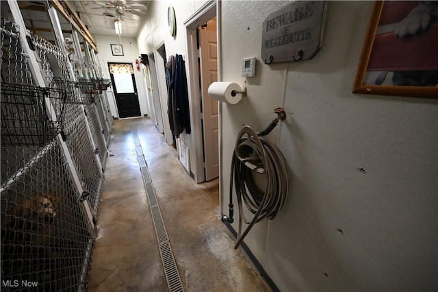 50277 Carroll Rd, East Liverpool, OH 43920 - hallway with concrete floors and a textured wall