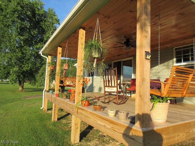297 Hales Lndg, Elizabeth, WV 26143 - deck with a ceiling fan and a lawn