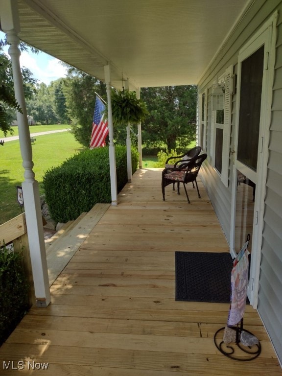 297 Hales Lndg, Elizabeth, WV 26143 - porch featuring a yard