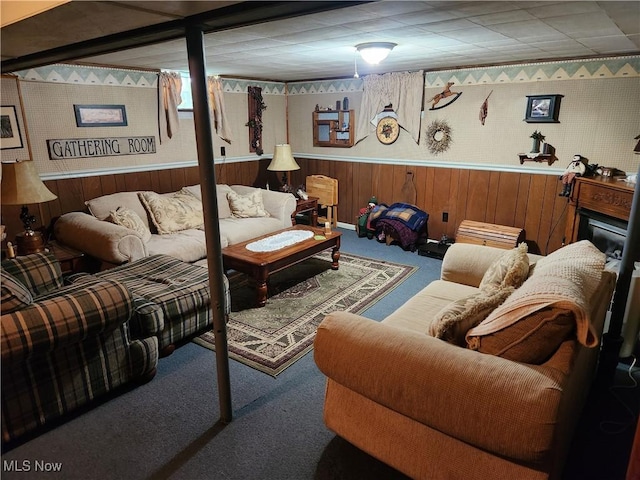 867 S 14th St, Sebring, OH 44672 - living area featuring carpet and wooden walls