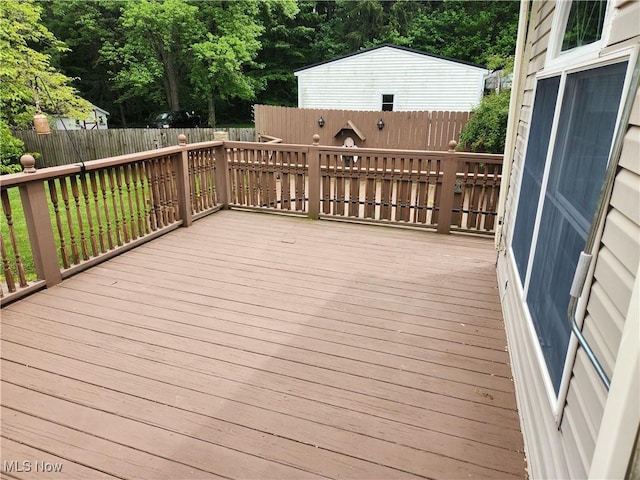 867 S 14th St, Sebring, OH 44672 - wooden deck with a fenced backyard