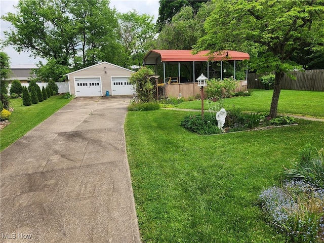 867 S 14th St, Sebring, OH 44672 - view of front facade with a garage and an outbuilding
