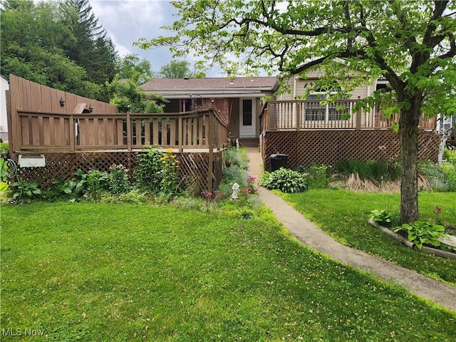 867 S 14th St, Sebring, OH 44672 - view of grassy yard with a wooden deck
