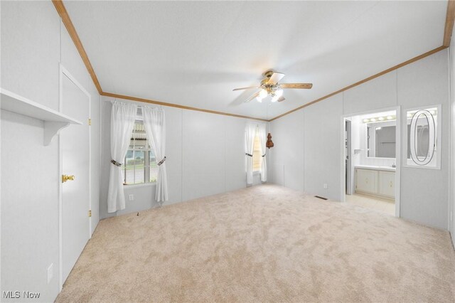 8 Maple Dr, Olmsted Twp, OH 44138 - unfurnished bedroom with ornamental molding, lofted ceiling, carpet flooring, a ceiling fan, and ensuite bathroom