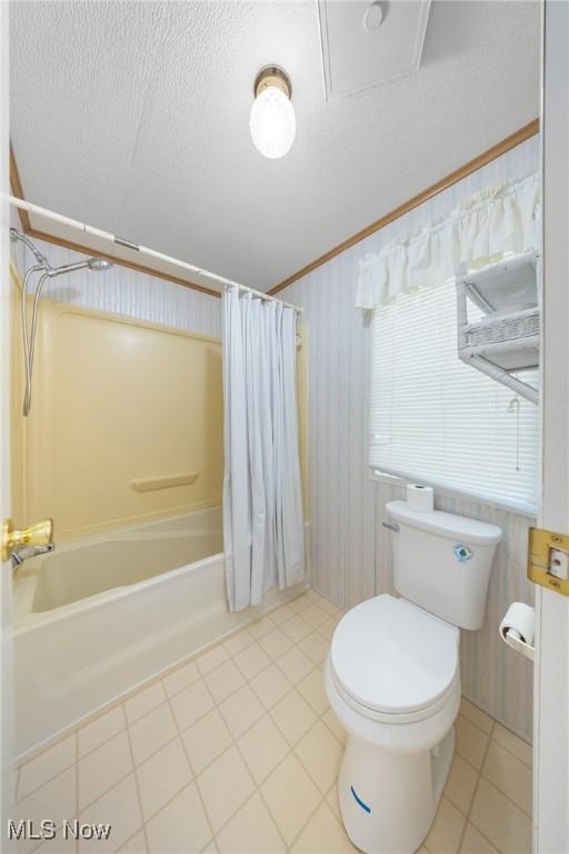 8 Maple Dr, Olmsted Twp, OH 44138 - bathroom with toilet, shower / bathtub combination with curtain, tile patterned flooring, and a textured ceiling