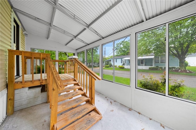 8 Maple Dr, Olmsted Twp, OH 44138 - unfurnished sunroom with lofted ceiling and healthy amount of natural light