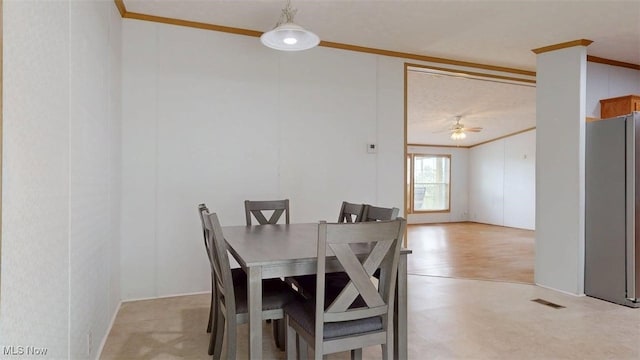 728 Rising Sun Ridge Rd, Walker, WV 26180 - dining room featuring crown molding and a ceiling fan