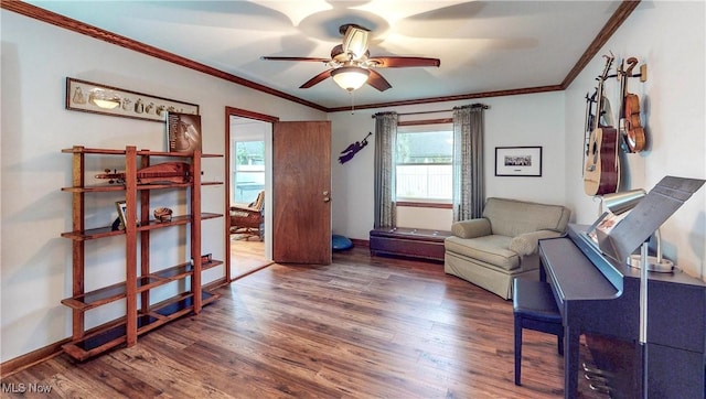 891 Sovereign Rd, Akron, OH 44303 - living area featuring a ceiling fan, wood finished floors, and ornamental molding
