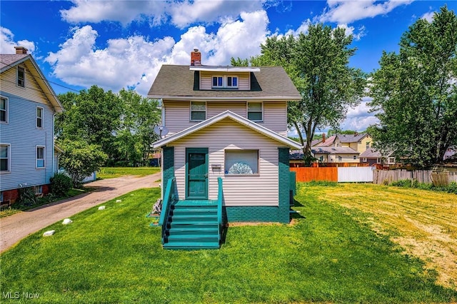 2021 17th St NE, Canton, OH 44705 - rear view of property featuring a chimney